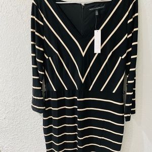 Black and beige dress with arrows